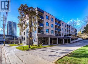 Cambridge apartment for rent - A modern apartment building with a clear blue sky above.