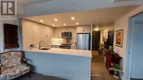 Toronto (Birchcliffe-Cliffside) condo for rent - A kitchen with a sink, stove, and refrigerator.