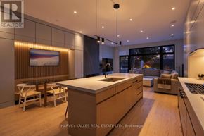 Toronto (Rosedale-Moore Park) apartment for rent - A modern kitchen with wooden cabinets and a large island.