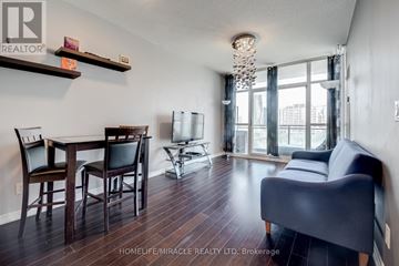Mississauga (City Centre) condo for rent - A living room with a dining table and chairs.