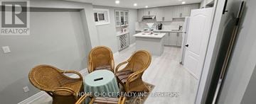 Markham (Raymerville) apartment for rent - A kitchen with a dining table and chairs.