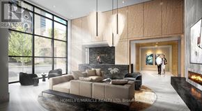 Hamilton (Corktown) condo for rent - A modern living room with a fireplace and a couple standing in the doorway.