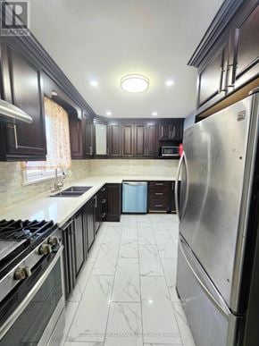 Toronto (Wexford-Maryvale) apartment for rent - A kitchen with a stove top oven and a refrigerator.