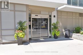 Toronto (Dovercourt-Wallace Emerson-Junction) condo for rent - A building with a glass door and a sign that says 818.