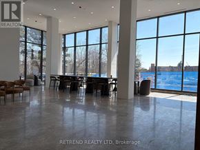 Toronto (Don Valley Village) condo for rent - A large room with a table and chairs in it.