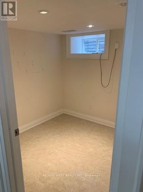 Toronto (Dovercourt-Wallace Emerson-Junction) apartment for rent - A room with a window and a white wall.