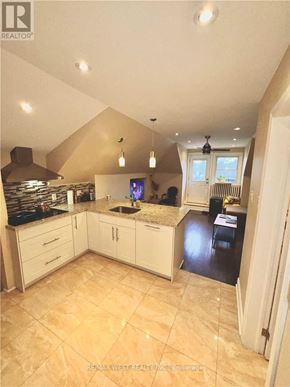 Toronto (Yonge-Eglinton) apartment for rent - A kitchen with a tiled floor and a counter top.
