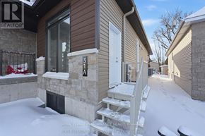Russell apartment for rent - A house numbered 31A is shown in a snowy environment.