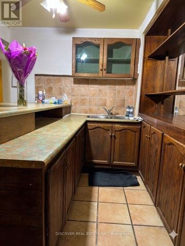 Mississauga (East Credit) apartment for rent - A kitchen with wooden cabinets and a tiled floor.
