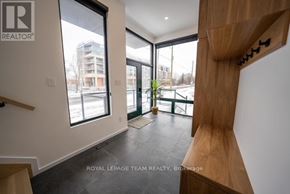 Ottawa apartment for rent - A room with a wooden column and a plant on the balcony.