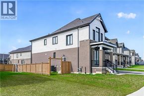 Hamilton apartment for rent - A row of houses with a REALTOR® logo in the corner.