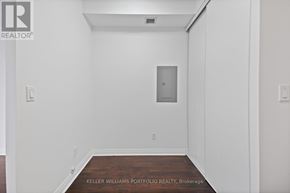 Toronto (Church-Yonge Corridor) condo for rent - A white room with a door and a wooden floor.
