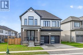 Hamilton (Mount Hope) apartment for rent - A modern two-story house with a garage is for sale.