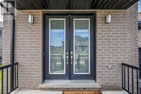 Hamilton (Mount Hope) apartment for rent - A double door with a glass window is the main focus of the image.