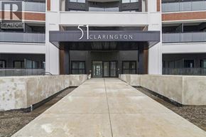 Bowmanville condo for rent - The entrance to a building with the number 51 and the word Clarington on it.