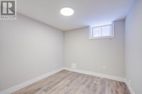 Toronto (Kensington-Chinatown) apartment for rent - A room with a window and wooden flooring.