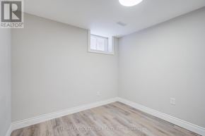 Toronto (Kensington-Chinatown) apartment for rent - A room with a window and wooden flooring.