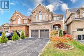 Innisfil (Alcona) apartment for rent - A large brick house with a garage is for sale.