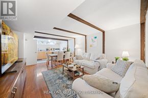 Richmond Hill (Crosby) apartment for rent - A living room with a white couch and a coffee table.