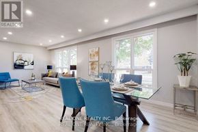 Aurora (Aurora Heights) apartment for rent - A dining room with a glass table and blue chairs.