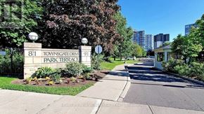 Vaughan (Crestwood-Springfarm-Yorkhill) condo for rent - A street sign for Townsgate Drive and Park Terrace is shown.