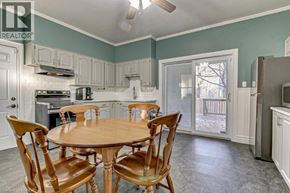 Scotland apartment for rent - A kitchen with a table and chairs.