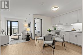 Thorold (Thorold Downtown) multi-family for rent - A modern kitchen with a dining table and chairs.