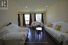 Toronto (West Humber-Clairville) apartment for rent - A brokerage office with two couches and a table in the middle.