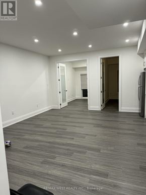 Toronto (Humber Summit) apartment for rent - A room with grey flooring and white walls.