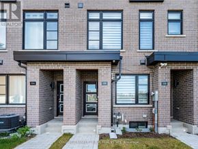 Toronto (Bendale) townhouse for rent - A building with the number 134 on the front door.