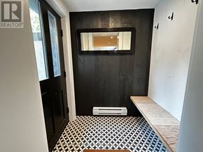 Toronto (Kennedy Park) apartment for rent - A bathroom with a black and white tiled floor.