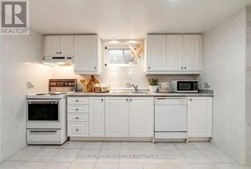 Toronto (Islington-City Centre West) apartment for rent - A white kitchen with a microwave on the counter.