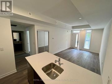 Toronto (Beechborough-Greenbrook) townhouse for rent - A spacious kitchen with a sink and a countertop.