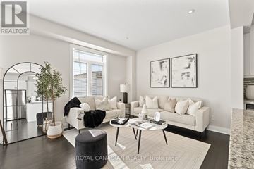 Waterloo apartment for rent - A living room with a white couch and a coffee table.