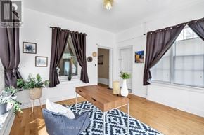 Smiths Falls apartment for rent - A living room with a white sofa and a coffee table.