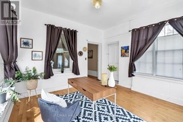 Smiths Falls apartment for rent - A living room with a white sofa and a coffee table.