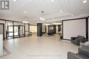 Toronto (York University Heights) condo for rent - A living room with a television and a glass table.