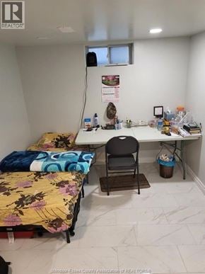 Windsor apartment for rent - A room with a bed, desk, and chair.