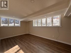 New Dundee apartment for rent - A room with a window showing a snowy landscape outside.