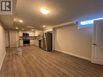 New Dundee apartment for rent - A kitchen area with a refrigerator, stove, and oven.