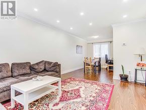 Richmond Hill (Crosby) apartment for rent - A living room with a rug and a couch.