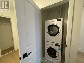 Hamilton (Central) condo for rent - A white door with a washing machine in the other side.