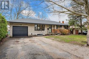 Centre Wellington (Fergus) apartment for rent - A house with a driveway in front of it.