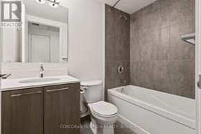 Toronto (Rouge) condo for rent - A bathroom with a toilet, sink, and bathtub.