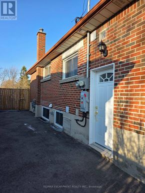 Hamilton (Bonnington) apartment for rent - A house with a white door and windows is for sale.