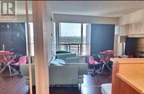 Toronto (Woburn) condo for rent - A living room with a view of the city.