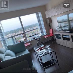 Toronto (Woburn) condo for rent - A kitchen with wooden cabinets and a white refrigerator.