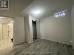 Vaughan (Vellore Village) apartment for rent - A room with a door and a window.