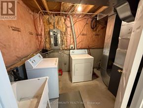 Toronto (Rouge) apartment for rent - A laundry room with a washer and dryer.