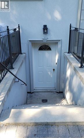 Markham (Grandview) apartment for rent - A white door with a black railing on either side.